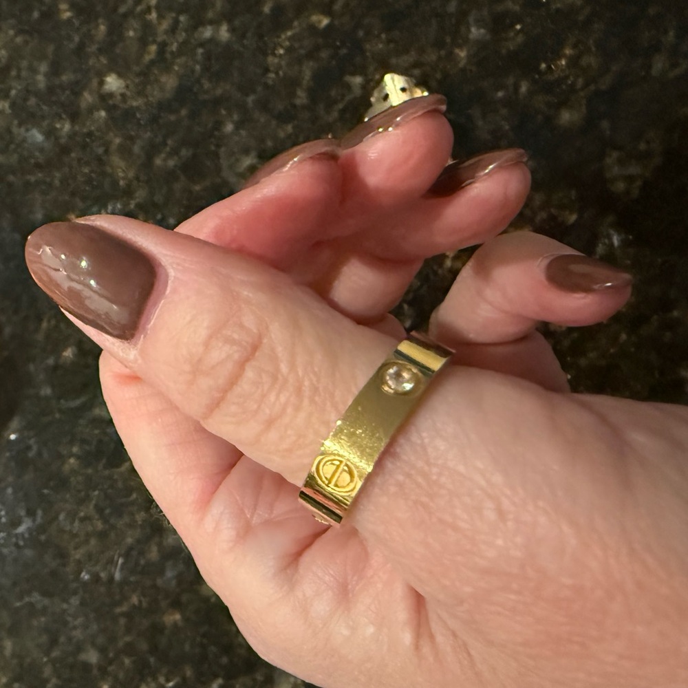 Gold Ring with Logo Detail